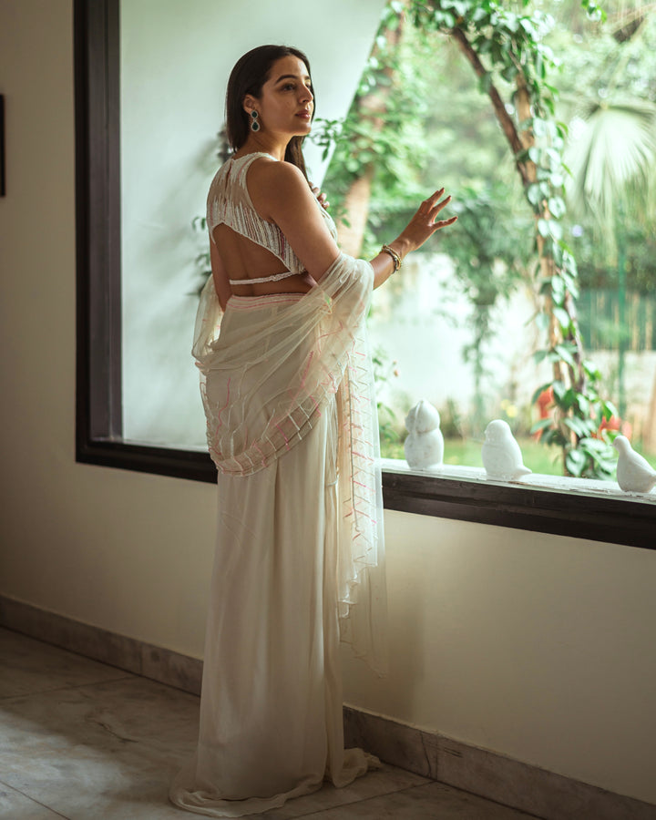 TARINI MANCHANDA- Snowy Draped Embroidered Saree with Halter Neck Bustier