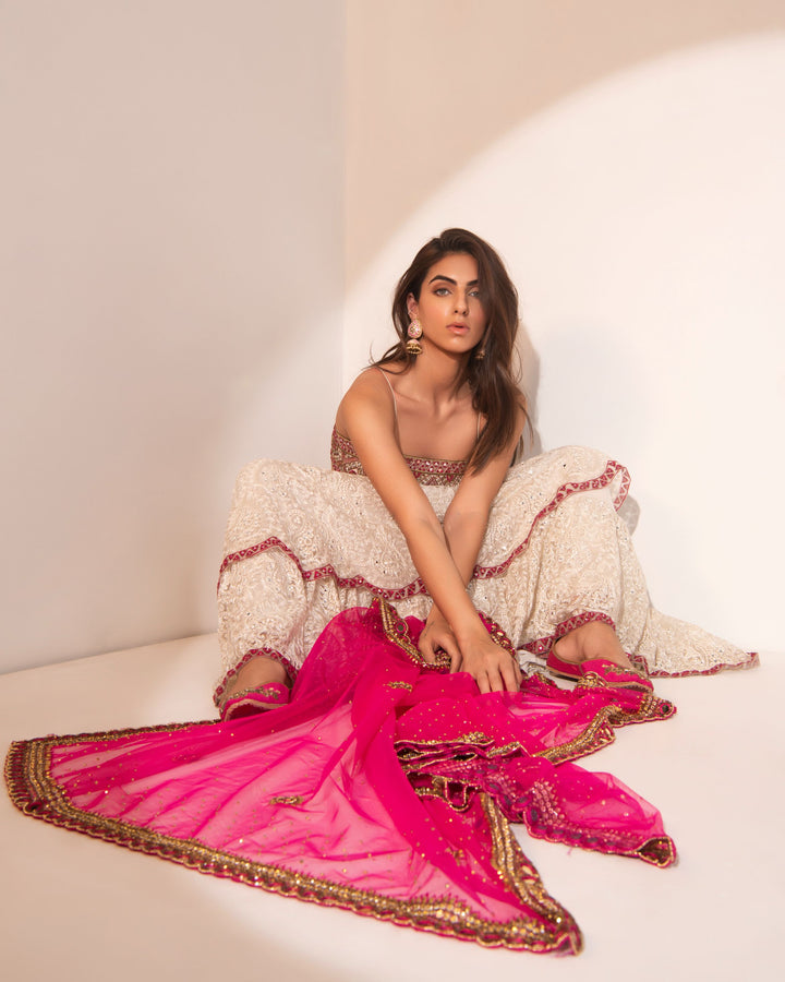 Double layered mirror work Anarkali with fushia dupatta